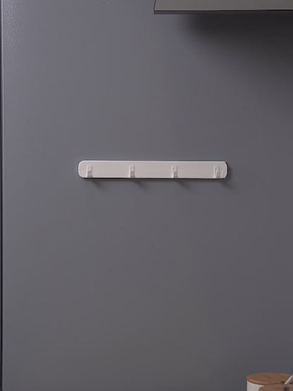 狭いスペースに設置可能なフック一列 壁に穴を開ける必要のないキッチン用壁掛けフック 創意的なデザインの家庭用サイドフック 粘着式で小物の収納に適したフック一列